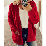 A plush women's teddy coat in a soft, fluffy texture, featuring a white color with hints of red and black accents. The coat has long sleeves, a collar, and is designed in a 5XL size, perfect for cozy winter wear.