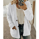 
A women's white teddy coat in a soft plush material, featuring a fluffy texture with long sleeves.