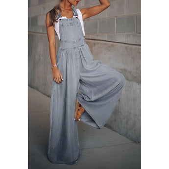 
A pair of women's wide-leg blue denim overalls with pockets, featuring shoulder straps and designed for a casual fit, displayed in a gray color and size XXL.