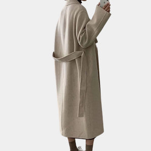 Women's wool blend oversized beige winter trench coat with a classic collar and long sleeves, featuring a loose fit and formal design.