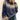 
A cozy wool ombre hand-knit chunky pullover sweater in shades of blue and grey, with long sleeves and a comfortable neckline, shown in a size 3XL.