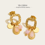 18K gold drop earrings with pink gemstones, tarnish-free, elegant circular design.