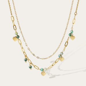 18K gold plated double-layer heart and green bead necklace for women in gold tone, featuring a delicate heart pendant and green gemstone beads.