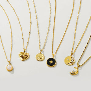 YA-CHAN Celestial Gold Necklaces featuring heart, moon, and star pendants with delicate gold chains.
