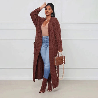 Oversized brown cable knit cardigan for women, featuring a cozy and comfortable design with long sleeves.