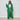 
A green oversized cozy cable knit cardigan for women, featuring a detailed knit pattern, long sleeves, and a relaxed fit.