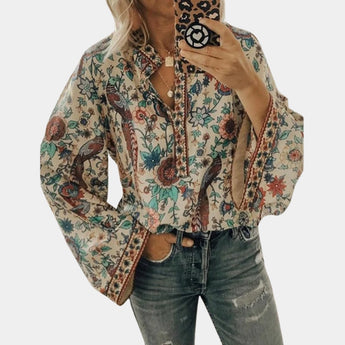 Yellow floral boho blouse for women featuring balloon sleeves and a V-neck design, shown in apricot color and size 3XL.