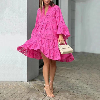 
A pink, knee-length, long sleeve day dress made from lightweight cotton, featuring eyelet details. The dress is designed in a plus size, 3XL, suitable for spring wear.