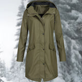 
A green women's waterproof hooded raincoat, size 2XL, featuring a lightweight and breathable design with long sleeves and a collar.