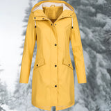 Yellow women's waterproof hooded raincoat in size 2XL, featuring a lightweight and breathable design with long sleeves and a protective collar.