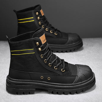 Black youth urban combat boots featuring a neon stripe and contrast stitching, suitable for outdoor and fashion wear.